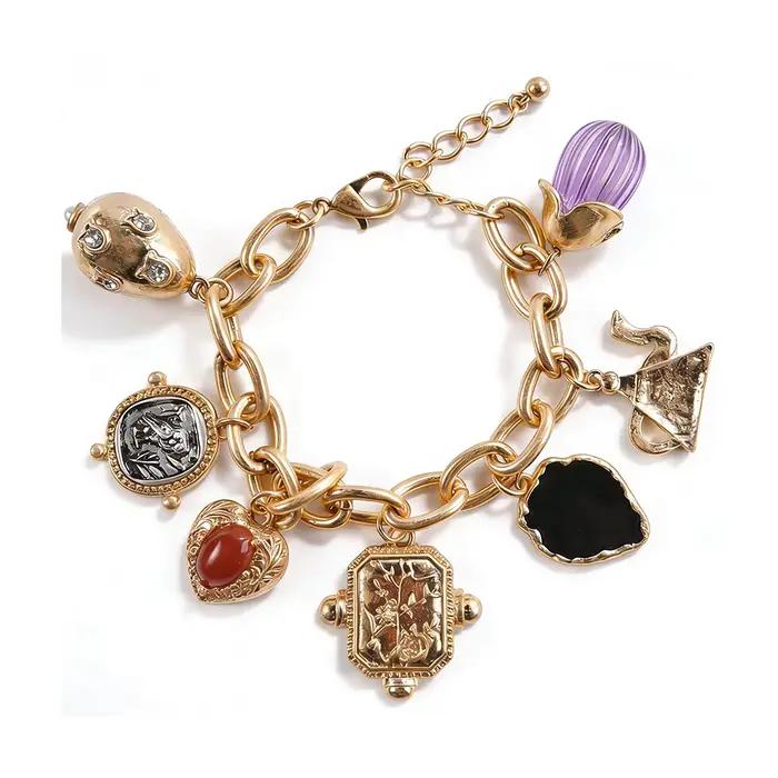 Bracelet à breloques dorées et pierres colorées à chaîne épaisse et longueur ajustable pour femme