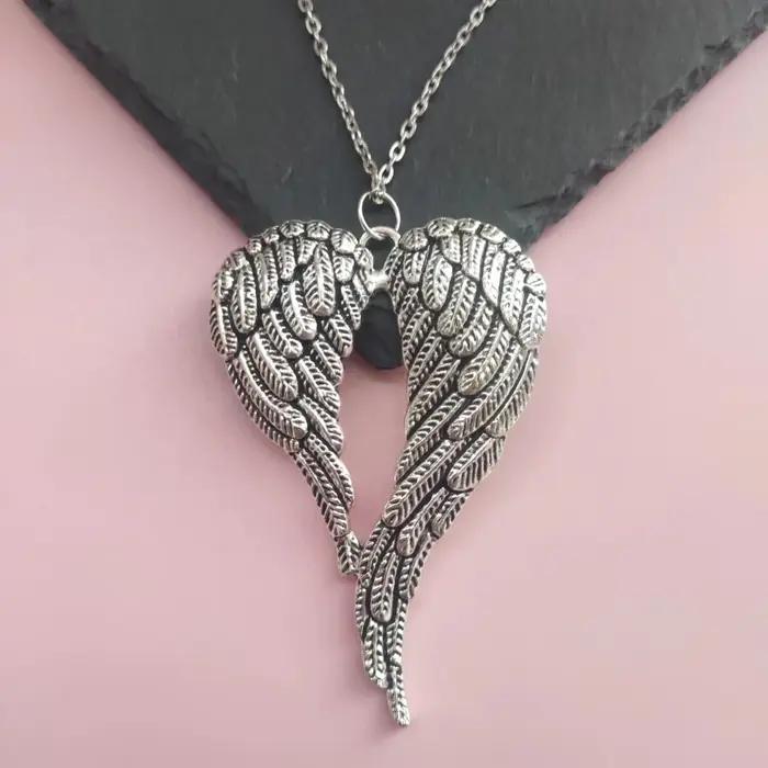 Collier vintage rétro unisex avec pendentif ailes d'ange en cuir noir pour femmes occassions spéciales