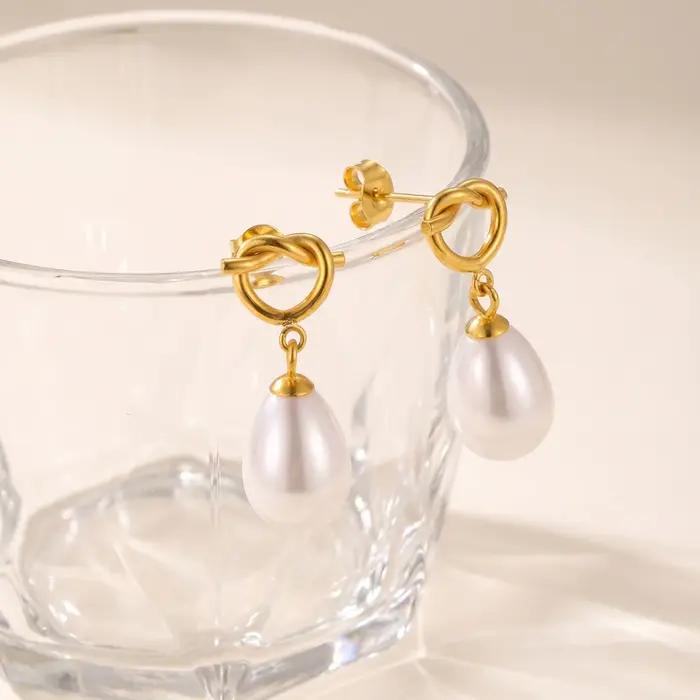 Boucles d'oreilles pendantes avec perle en forme de goutte et nœud, en acier inoxydable plaqué or 18 carats, bijoux étanches et anti-ternissement, cadeau idéal pour les fêtes