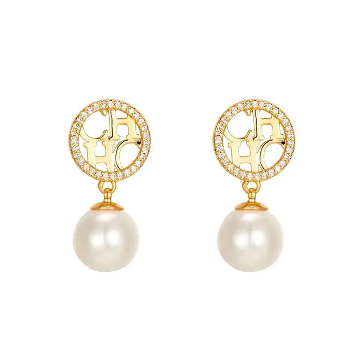 Boucles d'oreilles en perles élégantes pour femmes bijoux en alliage rouge sophistiqués pour différentes occasions et cadeaux de prestige