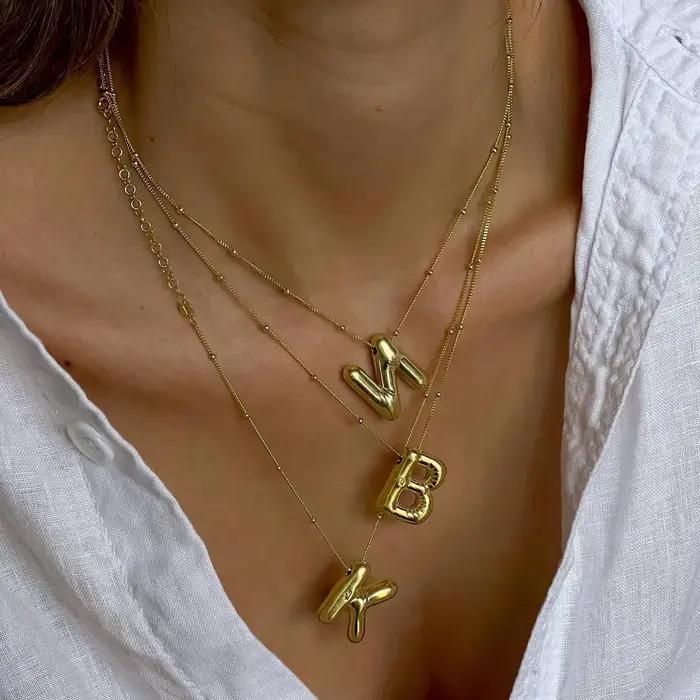 LATS – collier avec pendentif en métal plaqué or