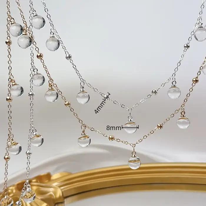 Pendentif en perles de verre rondes transparentes avec chaîne en métal pour créer des colliers et bracelets élégants pour femmes occasions spéciales