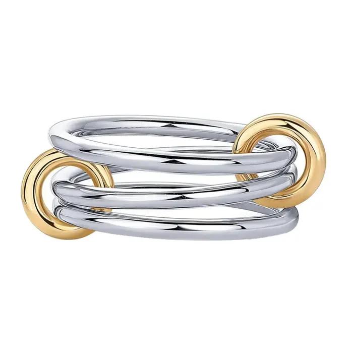 Bague en cuivre bicolore à quatre anneaux plaquée or 18 carats incrustée de zirconium pour femmes romantiques et modernes styles ins occasions spéciales