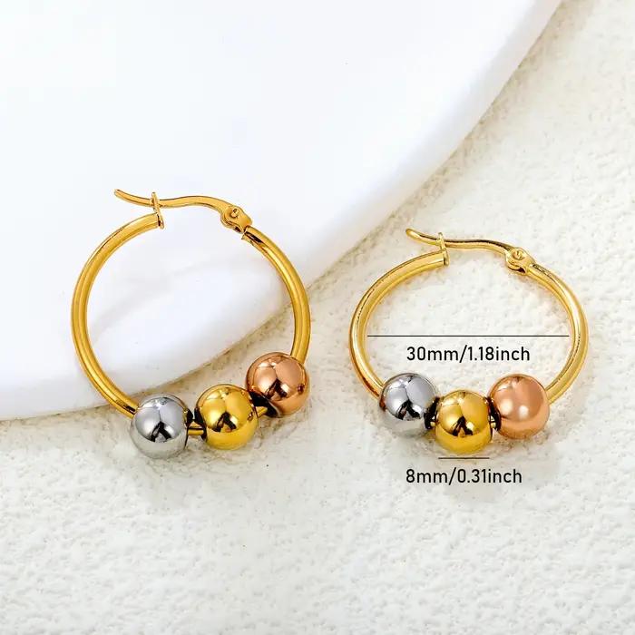 Boucles d'oreilles créoles Huggie à trois billes bicolores Or et Argent en Acier Inoxydable 316L