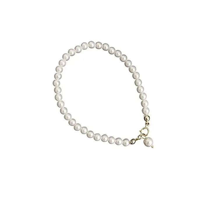 Bracelet à breloques en perles dorées style mignon romantique pour femmes occassions spéciales soirée party accessorise minimaliste élégant