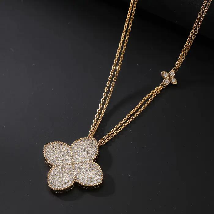Ensemble de bijoux élégant collier et boucles d'oreilles trèfle sertis de zircone cubique plaqués or 18 carats pour femmes occasions spéciales soirée mariage
