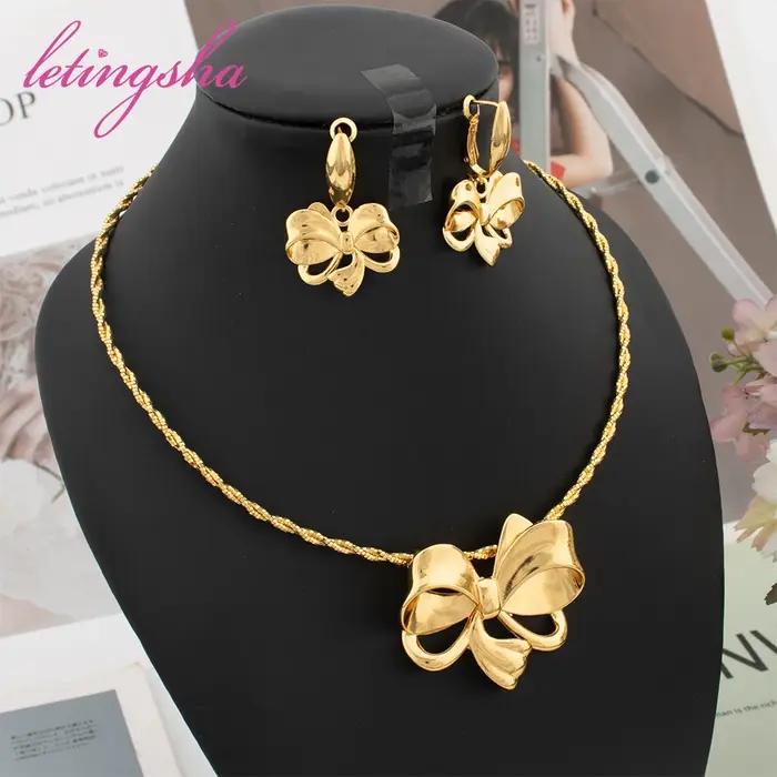 Ensemble de bijoux de luxe pour femmes design nœud papillon or jaune clair collier et boucles d'oreilles élégants pour occasions spéciales