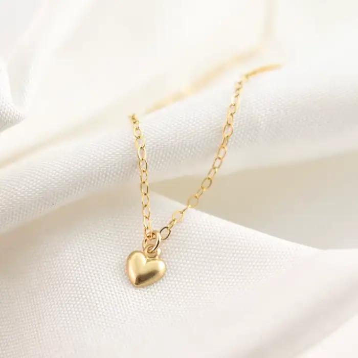 Pendentif en forme de cœur rempli d'or 14 carats