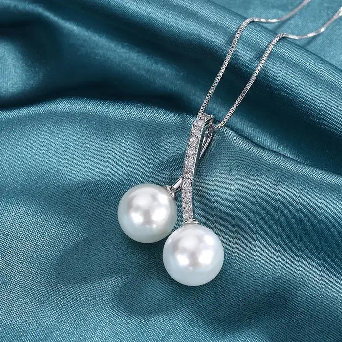 Collier pendentif perle de Tahiti fritillaire vintage pour femme