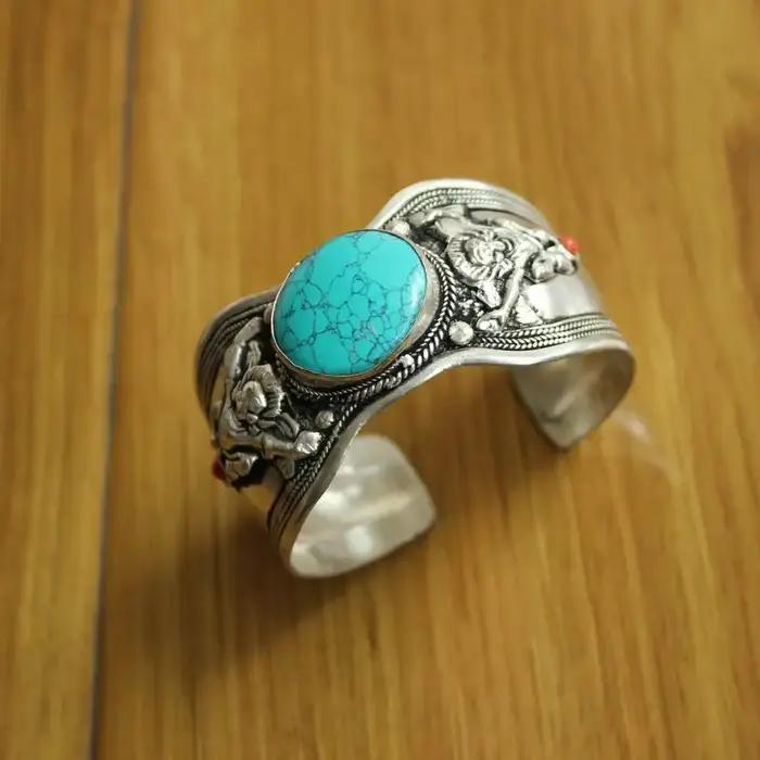 Bijoux faits à la main en argent tibétain incrusté de pierre turquoise naturelle Bracelet manchette large ouvert