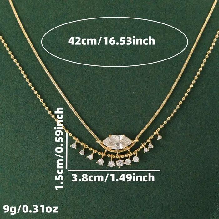 Collier de luxe en cuivre pour femmes avec pierres précieuses artificielles de forme marquise et design à pompon, idéal pour les mariages et les banquets.