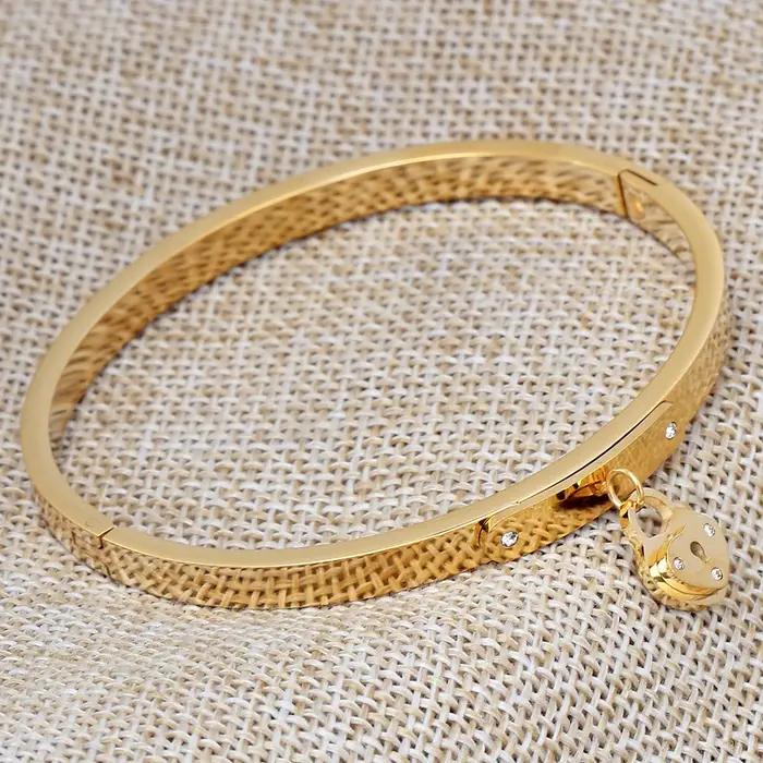 Bracelet en acier inoxydable serti de cristal or rose pour femmes occasions spéciales symbole amour éternel