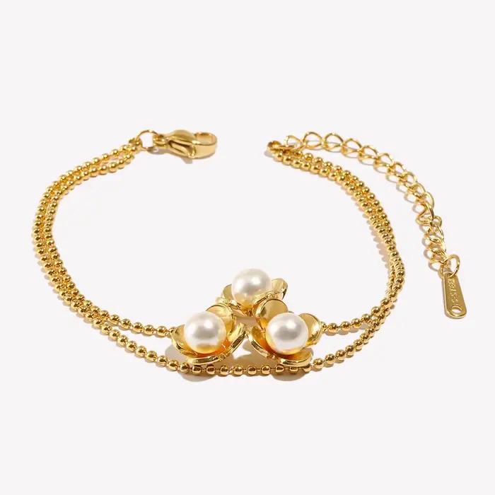 E.B.belle nouvelle chaîne de perles trois fleurs Bracelet de perles plaqué or 18 carats en acier inoxydable Style élégant accessoires de bijoux pour femmes