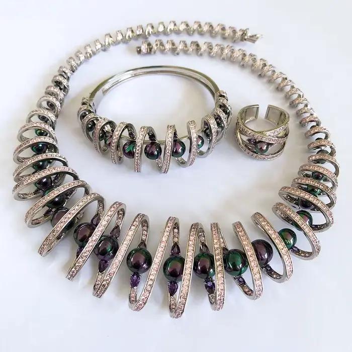 Ensemble de bijoux Missvikki Bridal avec perles et cristaux de rubis – Parure spirale 4 pièces avec zircon pavé pour mariages et célébrations