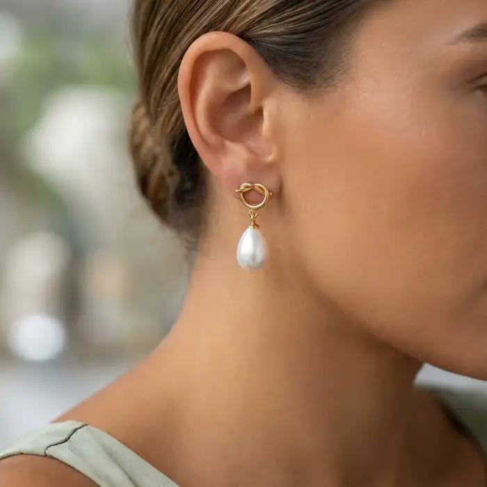 Boucles d'oreilles pendantes avec perle en forme de goutte et nœud, en acier inoxydable plaqué or 18 carats, bijoux étanches et anti-ternissement, cadeau idéal pour les fêtes